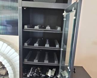 Black Entertainment Wall Unit with Glass-Door Towers and Integrated Fireplace Cabinet