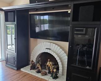 Black Entertainment Wall Unit with Glass-Door Towers and Integrated Fireplace Cabinet