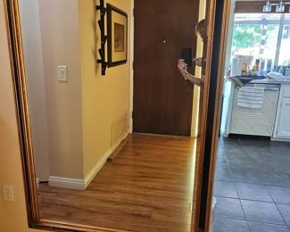 Ornate Giltwood and Black Neoclassical Style Wall Mirror