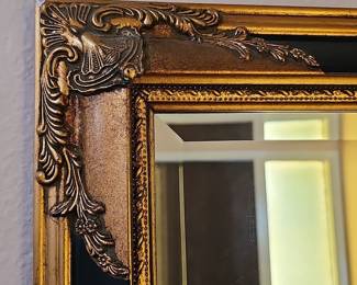 Ornate Giltwood and Black Neoclassical Style Wall Mirror
