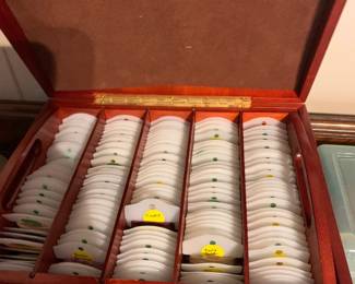 #152	box of embroidery thread with sampler on top 12x10x7	 $75.00 			