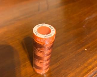 #096	200 spools aurified thread in a bin 	 $250.00 			