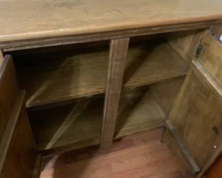 #146	laminated cabinet with 2 doors 2 shelves 34x13x33	 $75.00 			