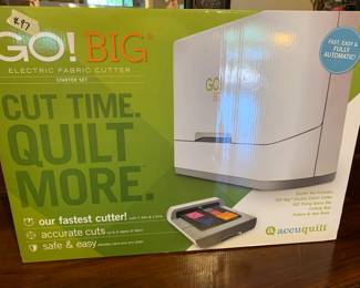 #097	accurate cut go big easy cut machine in box 	 $600.00 			