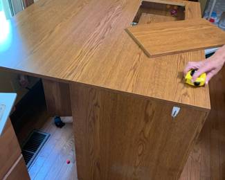 #145	laminate sewing machine table with manual lift 5 drawers lift table on wheels 42x20-39x29	 $400.00 			