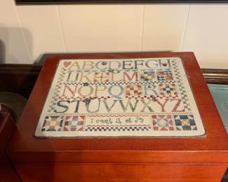 #152	box of embroidery thread with sampler on top 12x10x7	 $75.00 			