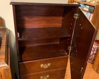 #055	laminate 2 door cabinet that looks like drawers 20x9.5x46.5	 $75.00 			