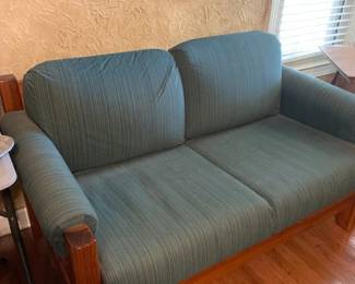 #018	loveseat wood and blue cushions  59 long	 $120.00 