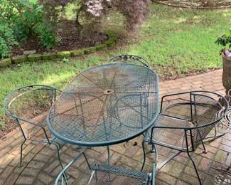#004	oval metal table green with 4 chairs 60x39x30	 $175.00 			