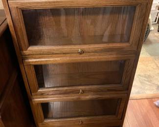 #023	barrister book case 3 glass one piece  24x9x38	 $100.00 			