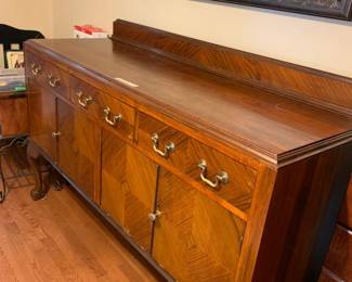 #057	as is buffet with dividers in drawer 4 door as is finish ball and claw feet 60x20x41	 $175.00 			