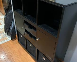 #087	black laminate shelf with 2 doors, 2 drawer and 3 basket 37x12x43	 $100.00 			