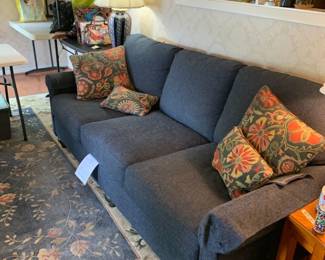 #051	blue sofa by Bassett attach back  83 long	 $220.00 			