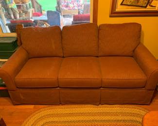 #013	tan basset sofa with loose back cushion 78 long	 $150.00 			