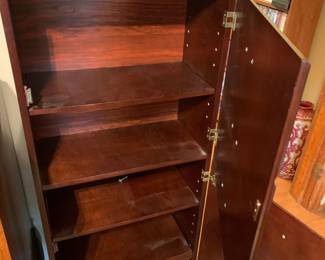 #055	laminate 2 door cabinet that looks like drawers 20x9.5x46.5	 $75.00 			