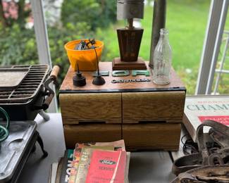 Vintage Piston lamp, media storage & Automotive manuals