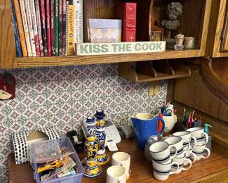 Cookbooks, coffee mugs, kitchenware