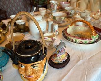 Tea cups, Toby-style teapot, ginger jars