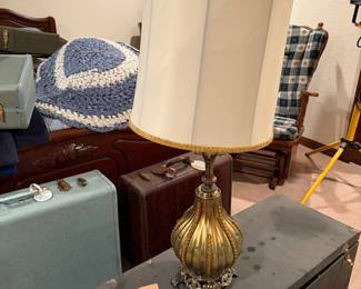 Table lamps, vintage suitcases