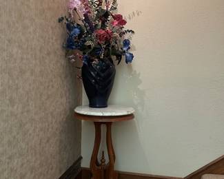 Faux floral decor, accent table