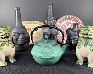 Pair Of Ceramic Foo Dogs, Vintage Black Matte Glass Peruvian Decanter Bottles. Chinese Cast Iron Tea