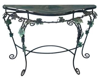 4 - Metal Leg/Base Table AS IS Water Damaged Top (Description): Metal leg and base table with decorative  ironwork featuring scrolled legs and  ornamental leaf designs. Sold as is with  water damaged top. Measures 31 inches high by  43.5 inches wide by 15.5 inches deep.