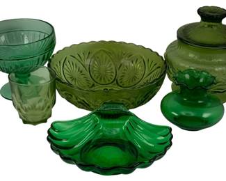 427 - 6 Green Glass Items (Description): A collection of six green glass items. This  assortment includes various decorative and  functional pieces in coordinating shades of  green glass.