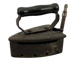 438 - Antique Strauss Gas Iron 6"x8.5"x4" (Description): Antique Strauss Gas Iron from Philadelphia,  PA. This cast iron pressing iron features a  wooden handle and gas connection fitting.  Measures 6" x 8.5" x 4". Used as is electric/electronic/mechanical item. No guarantee all components, untested.