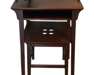 154 - Vintage Phone Table w/ Stool 34"x21"x15" (Description): Vintage phone table with matching stool. The  table features a gallery edge top with an  open storage compartment below and tapered  legs. The stool has a decorative pierced seat  design and stretcher base. Measures 34 inches high by 21 inches wide by 15 inches  deep.