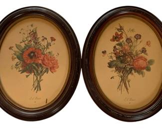 613 - 2 Framed  J.L. Prevost Botanical Floral Prints (Description): Pair  framed prints featuring floral bouquet  compositions signed J.L. Prevost. Each print  is presented in an oval dark wood frame.  Measurements: 14.5" x 11.5".