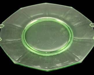 396 - Uranium Green Glass Serving Platter 11.5"x10.25" (Description): Uranium glass serving platter featuring an  octagonal shape with two handles. The  translucent green glass exhibits the  characteristic glow of uranium glass.  Measures 11.5 inches by 10.25 inches.