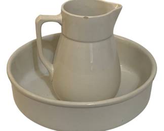 764 - Pitcher & Bowl Set 11"x15" (Description): S.C.I. Laveno, Verbanum Stone pitcher and  bowl set in classic white ceramic. This  traditional washstand set features a handled  pitcher paired with a coordinating round  basin. Measures 11 inches by 15 inches - minor chip on rim of pitcher.
