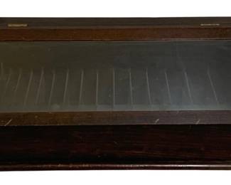 753 - Antique Display Case 8"x18.5"x7" (Description): Antique display case featuring a glass front  panel with a hinged lift-top design. The  wooden case has divided interior  compartments, suitable for showcasing small  collectibles or specimens. Measures 8 inches by 18.5 inches by 7 inches.