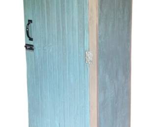 24 - Wood Storage Cabinet w/ Contents (Description): Wood storage cabinet with contents included.  Features a green-painted exterior with  vertical plank door design and metal  hardware. Measures 75 inches tall x 25.5  inches wide x 17 inches deep.