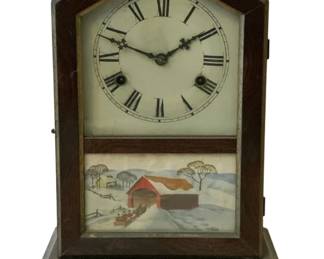 197 - New Haven Mantle Clock 14"x9.5"x4" (Description): New Haven mantle clock featuring a  steeple-style wooden case with a painted  glass panel depicting a winter scene with a  covered bridge. Measures 14 inches tall by 9  1/2 inches wide by 4 inches deep. Used as is electric/electronic/mechanical  item. No guarantee all components, untested.