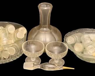483 - Assorted Glass Items (Description): A lot of assorted glass items including  decorative bowls, a decanter, stemmed  glasses, and various small glass vessels.