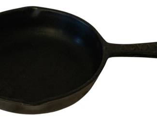 248 - Advance Cast Iron Skillet 7" (Description): Advance cast iron skillet measuring 7 inches  round. Features a classic design with pour  spouts and a hanging hole in the handle.