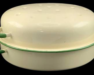 337 - Enamelware Dutch Oven 7"x15"x10.5" (Description): Enamelware Dutch oven with lidded design.  Features a cream-colored body with green trim  on the rim and handles. Measures 7 inches by  15 inches by 10 inches.