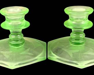375 - Pair of Green Glass Candle Holders (Description): A two-piece set of green glass candle  holders. Each measures 3.5 inches by 4.25  inches.