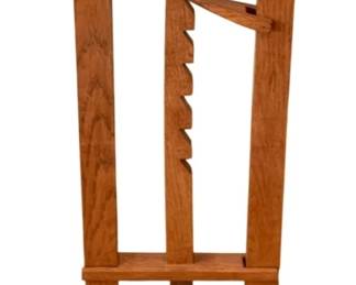 62 - Round Wood Plant Stand 35"x14" (Description): A round wood plant stand featuring a circular  top supported by a sturdy wooden frame. The  stand measures 35 inches tall by 14 inches in  diameter.