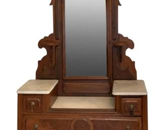 602 - Antique Marble Top Dresser w/ Mirror 93"x48"x18.5" (Description): Antique dresser with mirror. This  Victorian-era piece features a carved crest  with decorative scrollwork above an arched  mirror. The base includes marble-topped side  shelves flanking the mirror, two small upper drawers, and three larger drawers below with  circular medallion details and drop-pull  hardware. Measures 93 inches tall x 48 inches  wide x 18.5 inches deep.