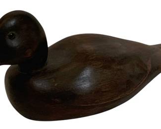 747 - Wood Duck Decoy 5.25"x11.5"x5" (Description): Wood duck decoy measuring 5.25 inches by 11.5  inches by 5 inches. A carved wooden  waterfowl figure in a classic resting pose.
