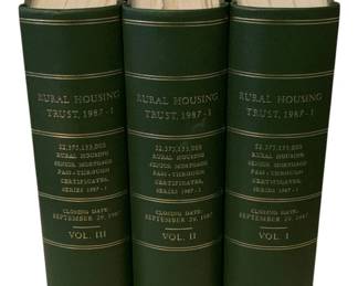 120 - 3  Rural Housing Trust 1987 Books (Description): A three-piece set of Rural Housing Trust  books. These bound volumes document the Rural  Housing Senior Mortgage Pass-Through  Certificates, Series 1987-1, with a closing  date of September 29, 1987. The set includes Volumes I, II, and III, each bearing the name  Frances B. Calhoun. The volumes reference  $2,375,133,000 in Rural Housing certificates.