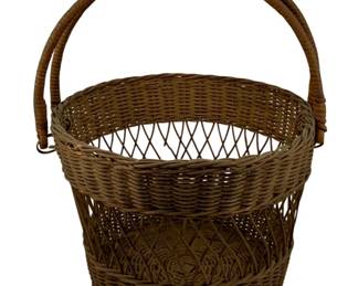 434 - Antique Basket 14"x12"x10.5" (Description): Antique woven basket with a swing handle. The  basket features a tapered form with  decorative open weave sections. Measures 14  inches by 12 inches by 10.5 inches.