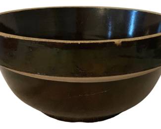 229 - Stoneware Mixing Bowl 4"x8.5" (Description): Stoneware mixing bowl with traditional brown  glaze and unglazed accent bands. Measures 4  inches tall by 8.5 inches in diameter.