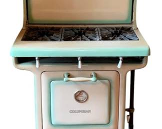 453 - Columbian Cast Iron Enamel Stove (Description): Columbian cast iron enamel stove featuring a  classic vintage design with a porcelain  enamel finish. The stove includes a  four-burner cook top and an oven compartment.  Measures 54 1/2 inches high by 27 inches wide by 16 inches deep. Used as is electric/electronic/mechanical  item. No guarantee all components, untested.