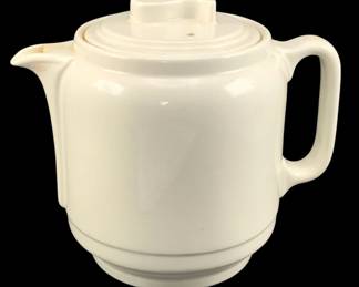 365 - Vtg White Ceramic Teapot 8"x9"x6" (Description): Vintage ceramic teapot in white with an Art  Deco-inspired design. Features a lidded top  with decorative finial, angular handle, and  tapered spout. The piece is unmarked.  Measures 8 inches by 9 inches by 6 inches.