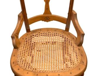 626 - Antique Chair 34"x17"x17" (Description): Antique chair featuring a carved crest rail,  shaped splat, caned seat, and turned legs.  Measures 34 inches high by 17 inches wide by  17 inches deep.
