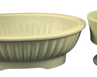 361 - 2 Pottery Planters Haeger & Floraline (Description): Two-piece lot of pottery planters by Haeger  and Floraline. Measurements: 4 x 11 x 7.5