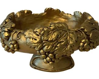 219 - Painted Plaster Compote 9"x15"x12" (Description): Painted plaster compote featuring ornate  decorative relief work. The piece has a  gilded finish and stands on a footed base.  Measures 9 inches by 15 inches by 12 inches.
